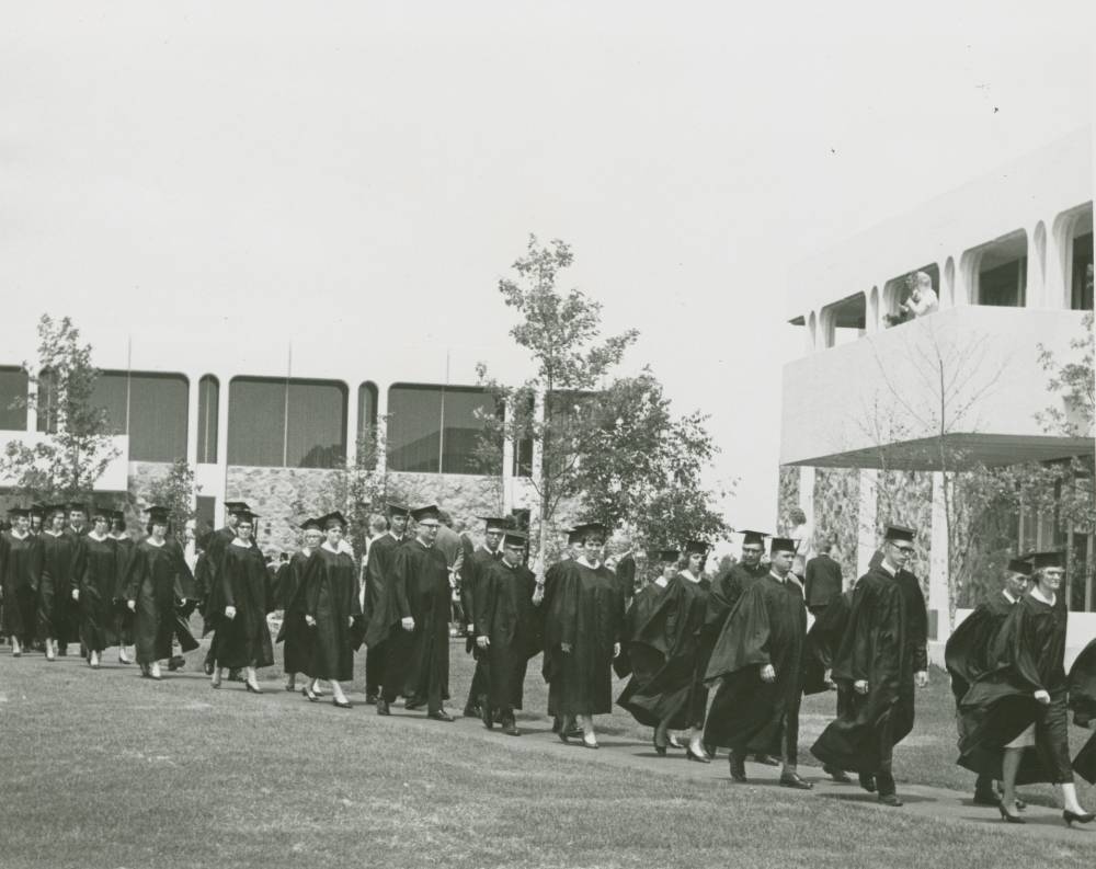 Students walking to graduation.